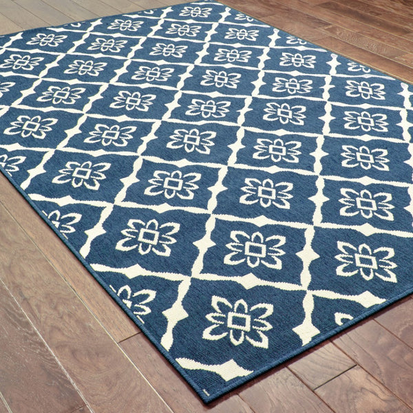HomeRoots 5' Blue and Ivory Floral Area Rug - Stain Resistant, Durable Design for Indoor and Outdoor Spaces 7'10" x 10'10" 507162