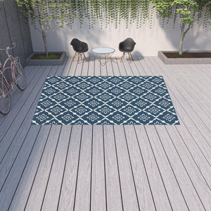 HomeRoots 5' Blue and Ivory Floral Area Rug - Stain Resistant, Durable Design for Indoor and Outdoor Spaces 8'6" x 13' 507163