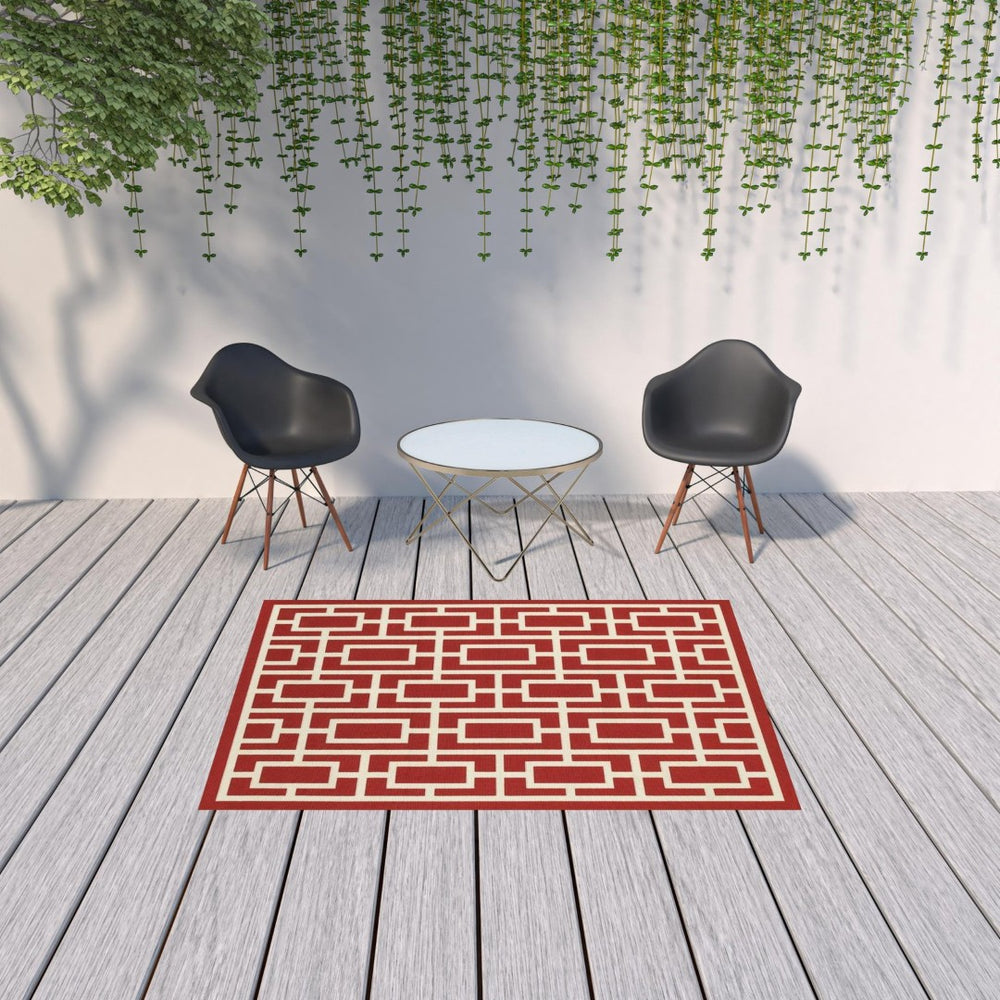 HomeRoots 5' Indoor Outdoor Geometric Area Rug in Red and Ivory - Stain Resistant, Durable, Stylish Design 5'3" x 7'6" 507192