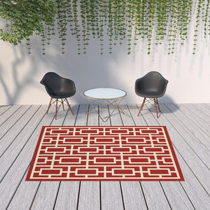 HomeRoots 5' Indoor Outdoor Geometric Area Rug in Red and Ivory - Stain Resistant, Durable, Stylish Design 6'7" x 9'6" 507193