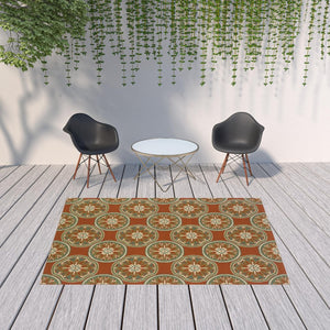 HomeRoots 7' Stylish Stain-Resistant Floral Area Rug for Indoor & Outdoor Use - Perfect for High-Traffic Spaces Orange/ Ivory 6'7" x 9'6" 507247