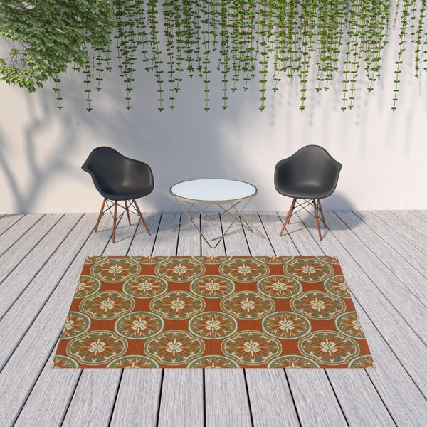 HomeRoots 7' Stylish Stain-Resistant Floral Area Rug for Indoor & Outdoor Use - Perfect for High-Traffic Spaces Orange/ Ivory 6'7" x 9'6" 507247