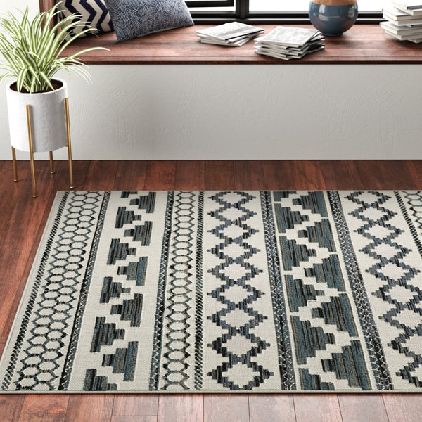 HomeRoots 5' Blue and Beige Geometric Indoor/Outdoor Area Rug – Stain and Water Resistant for Easy Care 6'7" x 9'2" 507467