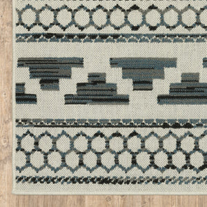 HomeRoots 5' Blue and Beige Geometric Indoor/Outdoor Area Rug – Stain and Water Resistant for Easy Care 6'7" x 9'2" 507467