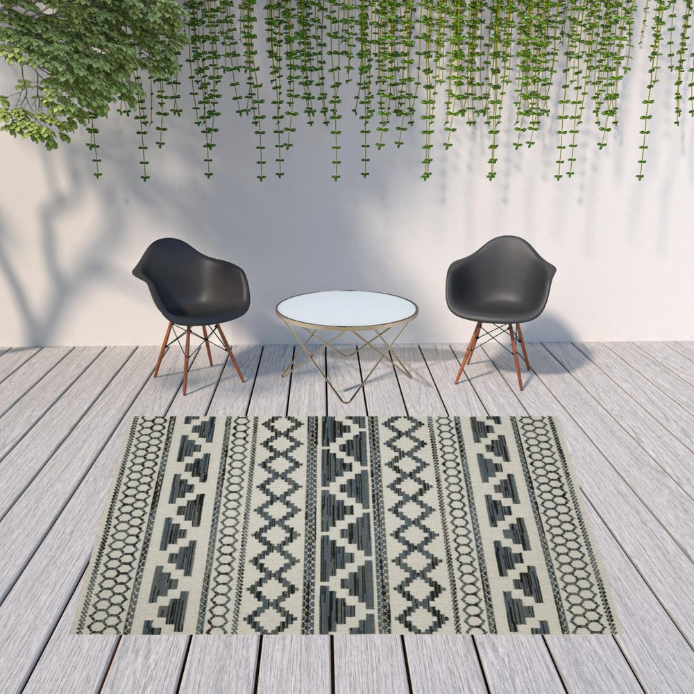 HomeRoots 5' Blue and Beige Geometric Indoor/Outdoor Area Rug – Stain and Water Resistant for Easy Care 7'10" x 10' 507468