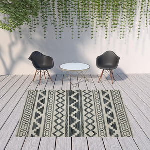 HomeRoots 5' Blue and Beige Geometric Indoor/Outdoor Area Rug – Stain and Water Resistant for Easy Care 7'10" x 10' 507468