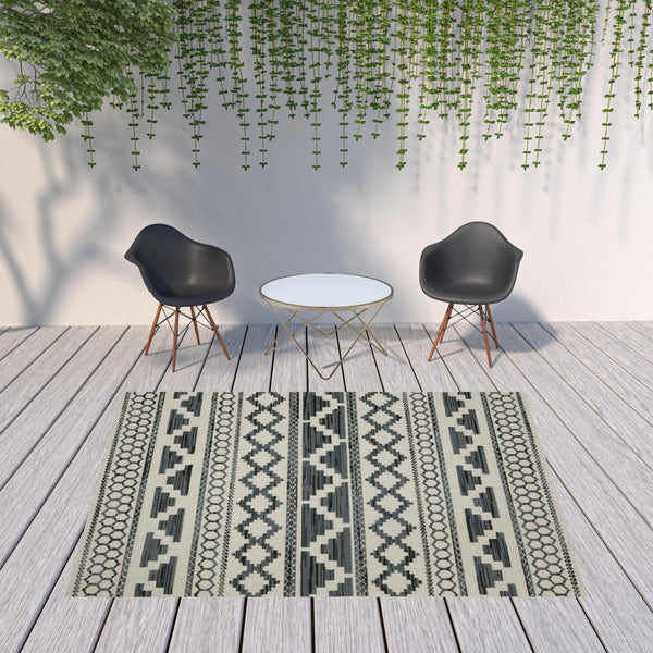 HomeRoots 5' Blue and Beige Geometric Indoor/Outdoor Area Rug – Stain and Water Resistant for Easy Care 7'10" x 10' 507468