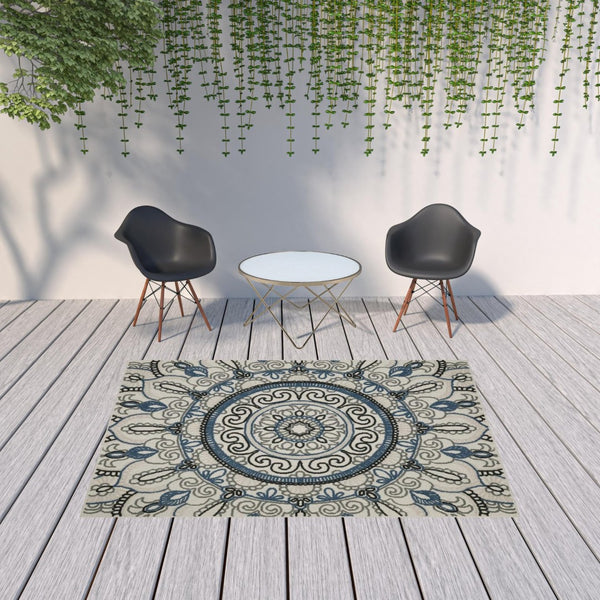 HomeRoots 5' Stylish Blue and Beige Geometric Area Rug - Stain Resistant, Versatile for Indoor/Outdoor Use 6'7" x 9'2" 507473