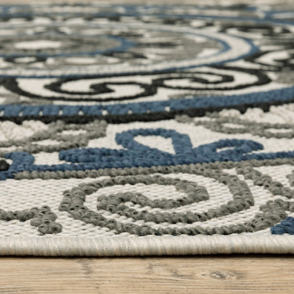HomeRoots 5' Stylish Blue and Beige Geometric Area Rug - Stain Resistant, Versatile for Indoor/Outdoor Use 6'7" x 9'2" 507473