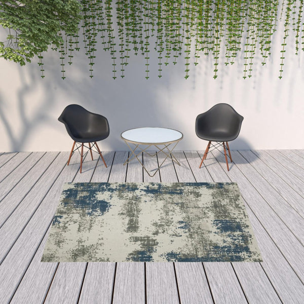 HomeRoots 5' Blue and Beige Abstract Indoor-Outdoor Area Rug - Stain Resistant, Durable, Easy to Clean Design 6'7" x 9'2" 507479