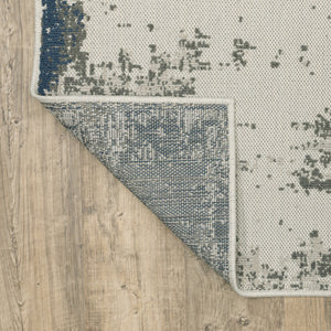 HomeRoots 5' Blue and Beige Abstract Indoor-Outdoor Area Rug - Stain Resistant, Durable, Easy to Clean Design 6'7" x 9'2" 507479