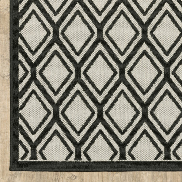 HomeRoots 5' Beige and Black Geometric Area Rug - Stain Resistant, Durable, Perfect for Indoor or Outdoor Use 5'3" x 7'3" 507484