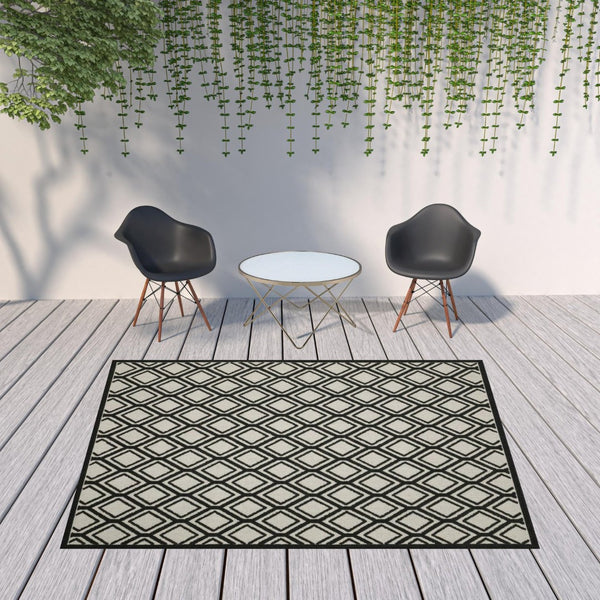 HomeRoots 5' Beige and Black Geometric Area Rug - Stain Resistant, Durable, Perfect for Indoor or Outdoor Use 7'10" x 10' 507486
