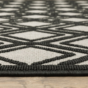 HomeRoots 5' Beige and Black Geometric Area Rug - Stain Resistant, Durable, Perfect for Indoor or Outdoor Use 7'10" x 10' 507486