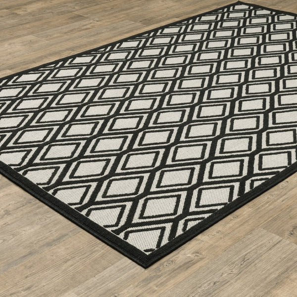 HomeRoots 5' Beige and Black Geometric Area Rug - Stain Resistant, Durable, Perfect for Indoor or Outdoor Use 7'10" x 10' 507486