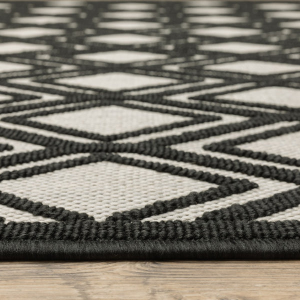 HomeRoots 5' Beige and Black Geometric Area Rug - Stain Resistant, Durable, Perfect for Indoor or Outdoor Use 9'10" x 12'10" 507487