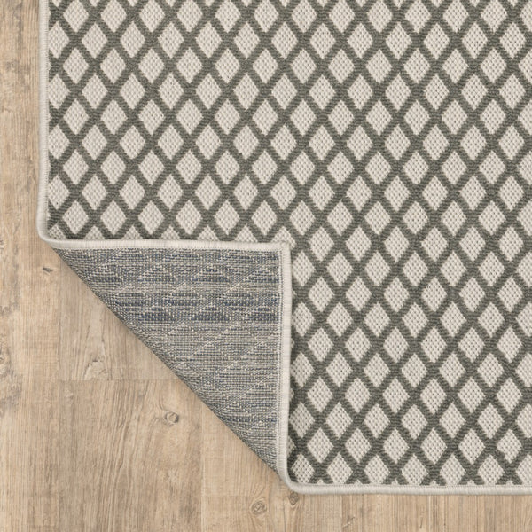 HomeRoots 5' Geometric Beige Area Rug – Durable, Stain Resistant Design for Indoor & Outdoor Spaces, Easy Care 6'7" x 9'2" 507491