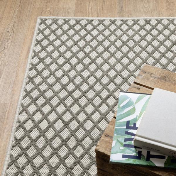 HomeRoots 5' Geometric Beige Area Rug – Durable, Stain Resistant Design for Indoor & Outdoor Spaces, Easy Care 9'10" x 12'10" 507493