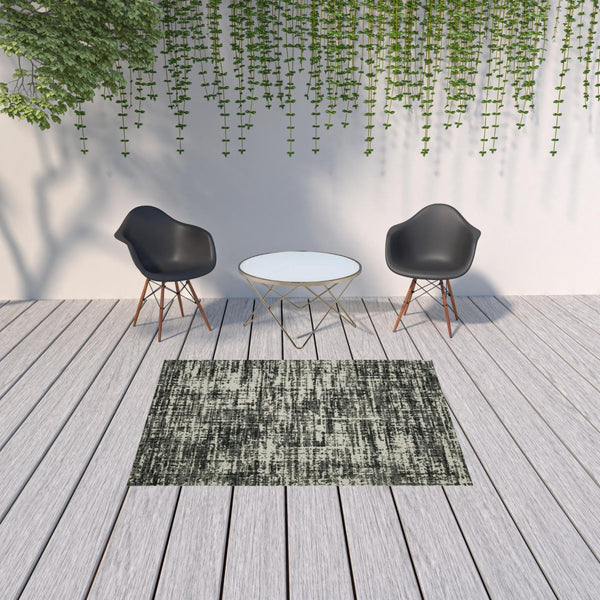 HomeRoots 5' X 7' Distressed Beige and Black Abstract Area Rug – Stain-Resistant for Indoor & Outdoor Use 5'3" x 7'3" 507496