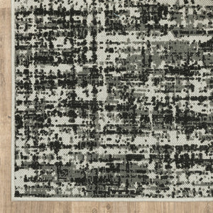 HomeRoots 5' X 7' Distressed Beige and Black Abstract Area Rug – Stain-Resistant for Indoor & Outdoor Use 5'3" x 7'3" 507496