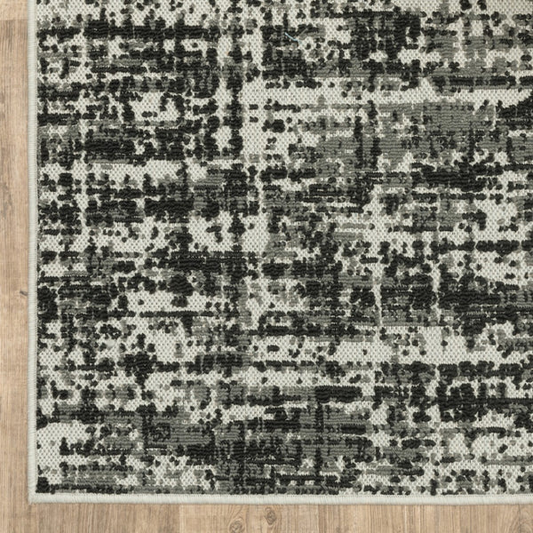 HomeRoots 5' X 7' Distressed Beige and Black Abstract Area Rug – Stain-Resistant for Indoor & Outdoor Use 5'3" x 7'3" 507496