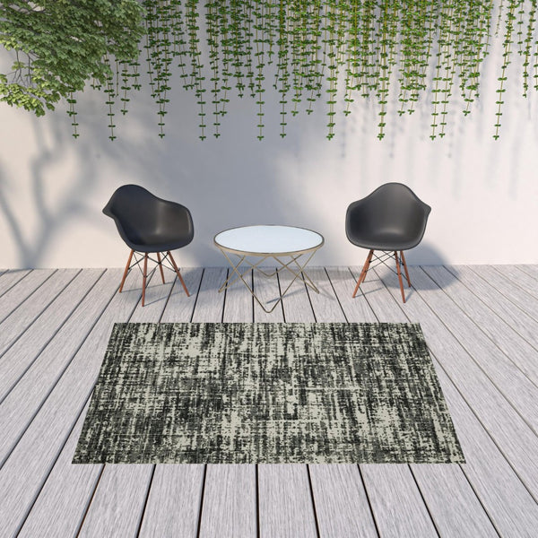 HomeRoots 5' X 7' Distressed Beige and Black Abstract Area Rug – Stain-Resistant for Indoor & Outdoor Use 6'7" x 9'2" 507497
