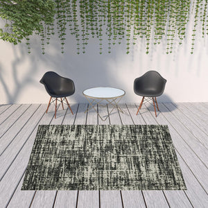 HomeRoots 5' X 7' Distressed Beige and Black Abstract Area Rug – Stain-Resistant for Indoor & Outdoor Use 7'10" x 10' 507498