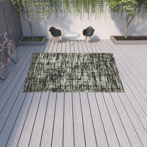 HomeRoots 5' X 7' Distressed Beige and Black Abstract Area Rug – Stain-Resistant for Indoor & Outdoor Use 9'10" x 12'10" 507499