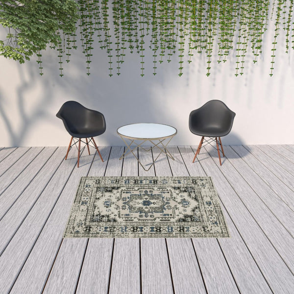 HomeRoots 5' X 7' Blue and Beige Oriental Area Rug - Stylish, Stain Resistant Design for Indoor and Outdoor Use 5'3" x 7'3" 507502