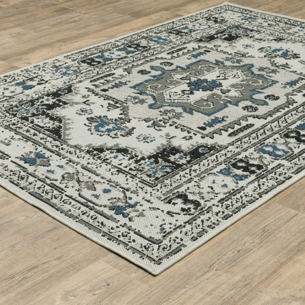 HomeRoots 5' X 7' Blue and Beige Oriental Area Rug - Stylish, Stain Resistant Design for Indoor and Outdoor Use 5'3" x 7'3" 507502