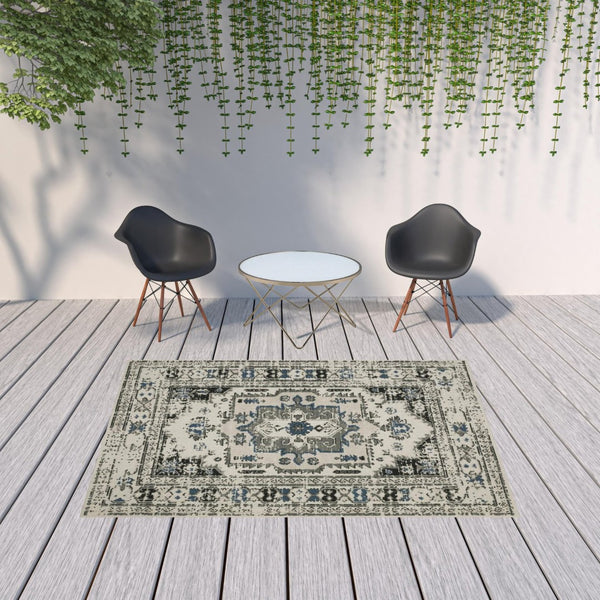 HomeRoots 5' X 7' Blue and Beige Oriental Area Rug - Stylish, Stain Resistant Design for Indoor and Outdoor Use 6'7" x 9'2" 507503