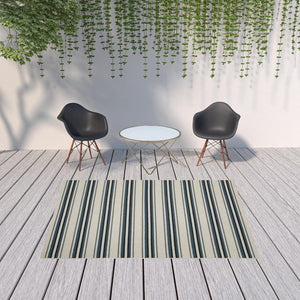HomeRoots 5' Blue and Beige Geometric Indoor-Outdoor Area Rug – Durable, Stain-Resistant, Easy-Care Design 6'7" x 9'2" 507521