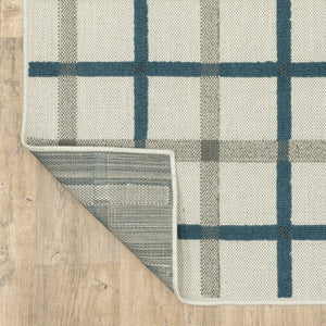 HomeRoots 5' Blue and Beige Geometric Area Rug - Stain Resistant, Versatile for Indoor and Outdoor Spaces 6'7" x 9'2" 507527