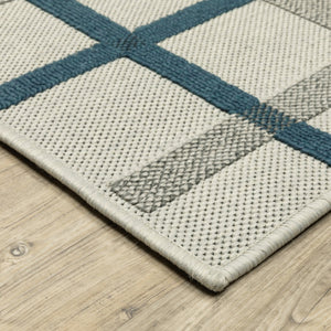 HomeRoots 5' Blue and Beige Geometric Area Rug - Stain Resistant, Versatile for Indoor and Outdoor Spaces 7'10" x 10' 507528