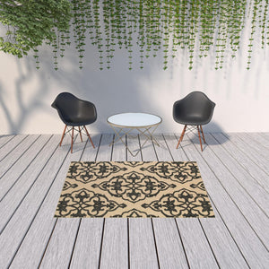HomeRoots 5' X 8' Beige and Black Medallion Area Rug - Stain Resistant for Indoor and Outdoor High-Traffic Spaces 5'3" x 7'6" 507556