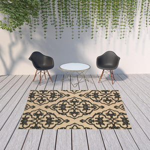 HomeRoots 5' X 8' Beige and Black Medallion Area Rug - Stain Resistant for Indoor and Outdoor High-Traffic Spaces 6'7" x 9'6" 507557