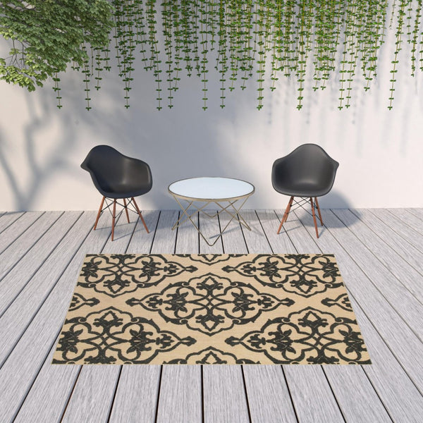HomeRoots 5' X 8' Beige and Black Medallion Area Rug - Stain Resistant for Indoor and Outdoor High-Traffic Spaces 6'7" x 9'6" 507557
