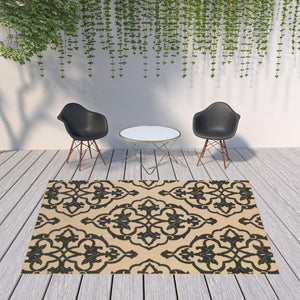 HomeRoots 5' X 8' Beige and Black Medallion Area Rug - Stain Resistant for Indoor and Outdoor High-Traffic Spaces 7'10" x 10'10" 507558