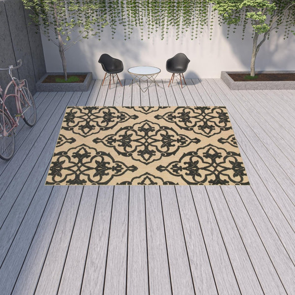 HomeRoots 5' X 8' Beige and Black Medallion Area Rug - Stain Resistant for Indoor and Outdoor High-Traffic Spaces 9'10" x 12'10" 507559