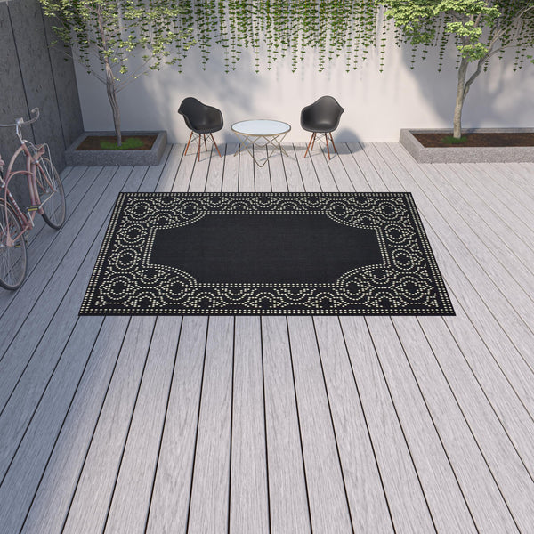 Homeroots 9' X 13' Black And Ivory Stain Resistant Indoor Outdoor Area Rug Black,Ivory Polypropylene 507683