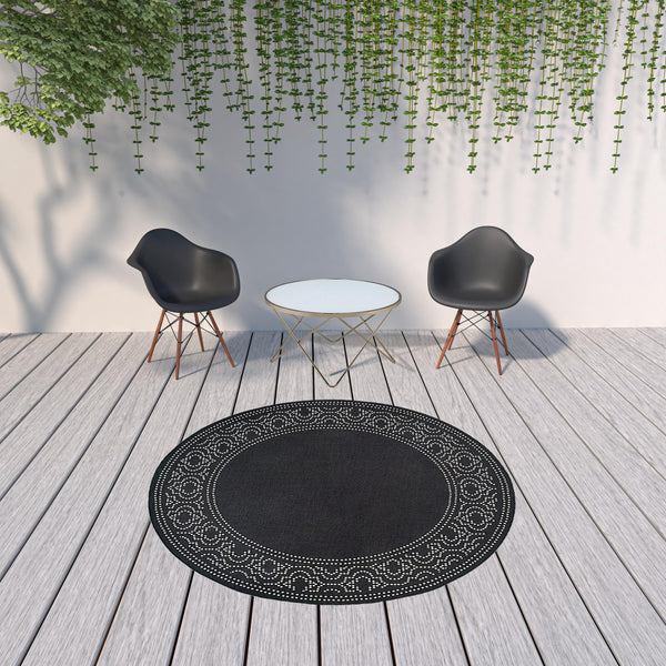 Homeroots 8' X 8' Black And Ivory Round Stain Resistant Indoor Outdoor Area Rug Black,Ivory Polypropylene 507684