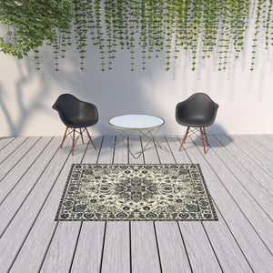 Homeroots 5' X 8' Ivory And Blue Oriental Stain Resistant Indoor Outdoor Area Rug  Polypropylene 507698