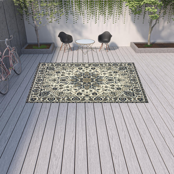 Homeroots 9' X 13' Ivory And Blue Oriental Stain Resistant Indoor Outdoor Area Rug  Polypropylene 507701