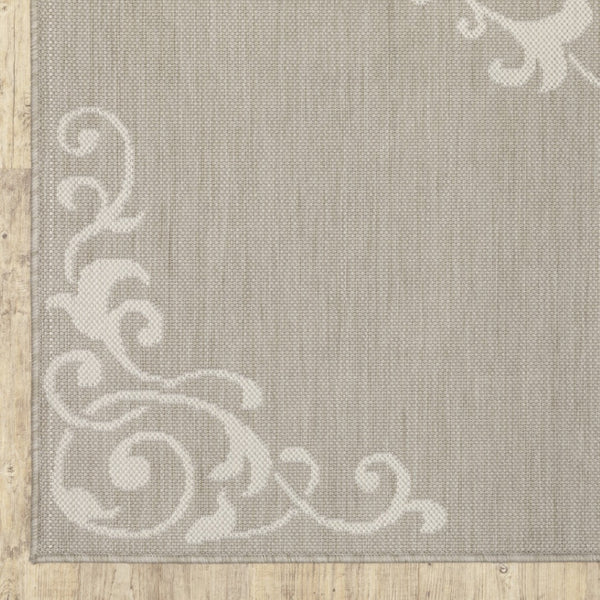HomeRoots 7' Gray and Ivory Oriental Area Rug - Stain Resistant, Durable, Stylish for Indoor and Outdoor Use 9'10" x 12'10" 507798