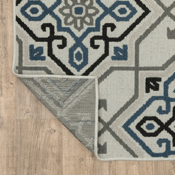 HomeRoots 5' Blue and Beige Oriental Area Rug - Stain Resistant, Indoor-Outdoor Design for Versatile Style 5'3" x 7'3" 507802