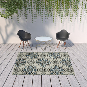 HomeRoots 5' Blue and Beige Oriental Area Rug - Stain Resistant, Indoor-Outdoor Design for Versatile Style 6'7" x 9'2" 507803