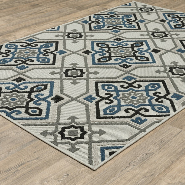 HomeRoots 5' Blue and Beige Oriental Area Rug - Stain Resistant, Indoor-Outdoor Design for Versatile Style 6'7" x 9'2" 507803