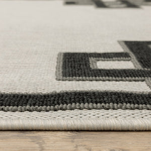 HomeRoots 5' X 7' Beige and Black Stain-Resistant Area Rug for Indoor and Outdoor Spaces – Durable Style! 6'7" x 9'2" 507813
