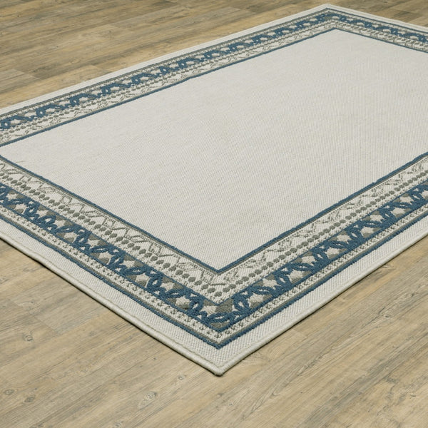 HomeRoots 5' Durable Blue and Beige Stain Resistant Indoor/Outdoor Area Rug for Easy Maintenance and Style 6'7" x 9'2" 507828