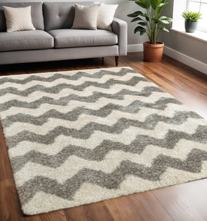 HomeRoots 2' Modern Grey and Ivory Geometric Shag Runner Rug - Soft, Stain-Resistant, Ideal for High-Traffic Areas 5' X 8' 507916